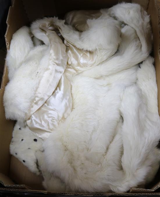 An ermine collar and a white fur jacket etc.